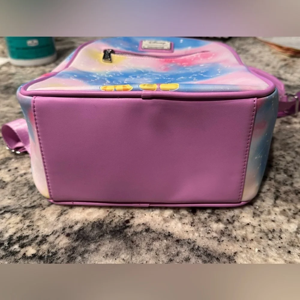Loungefly Disney Mickey Mouse Pastel Sky Backpack** 2 light scuffs on the front.